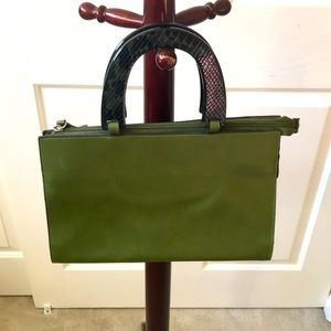 Green bag with reptile handles